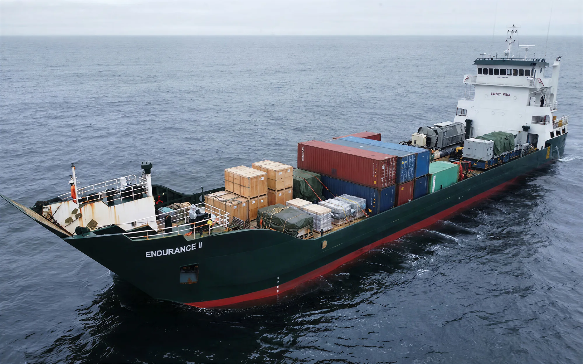 Endurance II under way, loaded with containers and crates